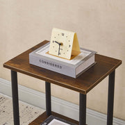 Industrial 2-Tier Side Table CT-331 with books and a vintage clock on top, perfect for any living space.