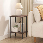 Industrial 2-Tier Side Table CT-331 with lamp, books, and plants in a cozy living room setting.