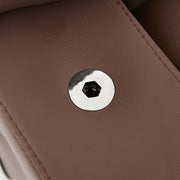 Close-up of the swivel rocker recliner assembly showing a sturdy metal screw in a brown upholstery.