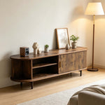 Tambour door TV stand showcasing spacious media storage shelves
