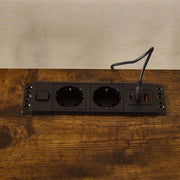TV Stand with Charging Station power outlet with two plugs and USB charging port on a wooden surface.