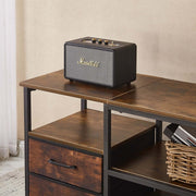 TV Stand with Charging Station featuring a stylish speaker on top, showcasing a modern living room setup.